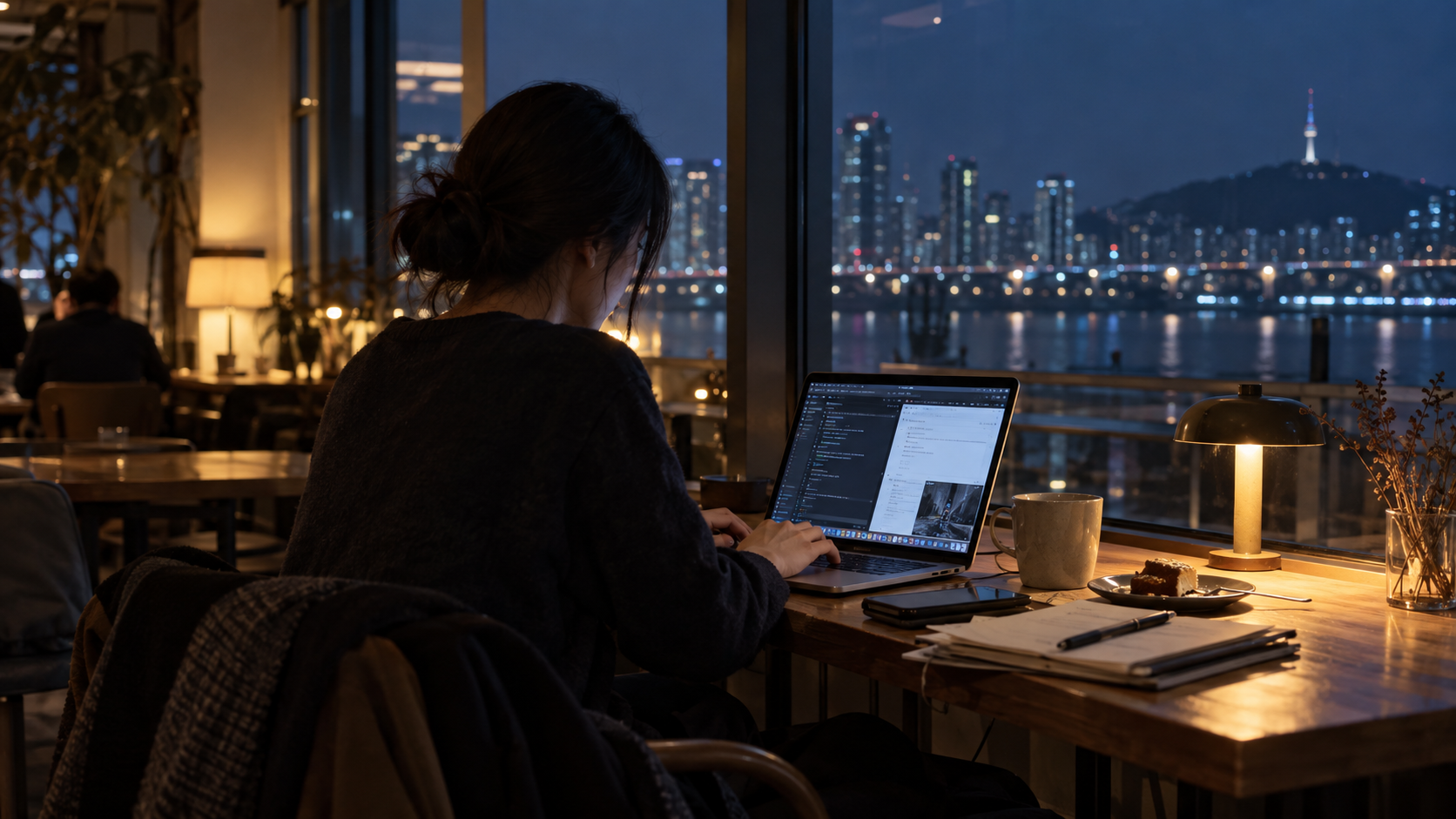 A Korean office worker managing a side business from home after work.